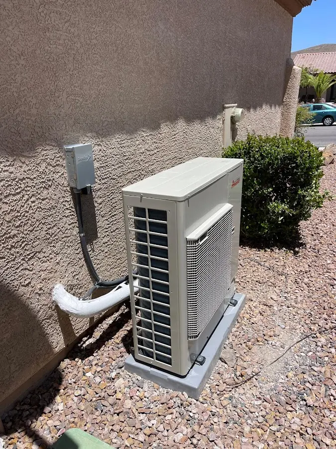 Residential air conditioning condenser unit in Great Falls